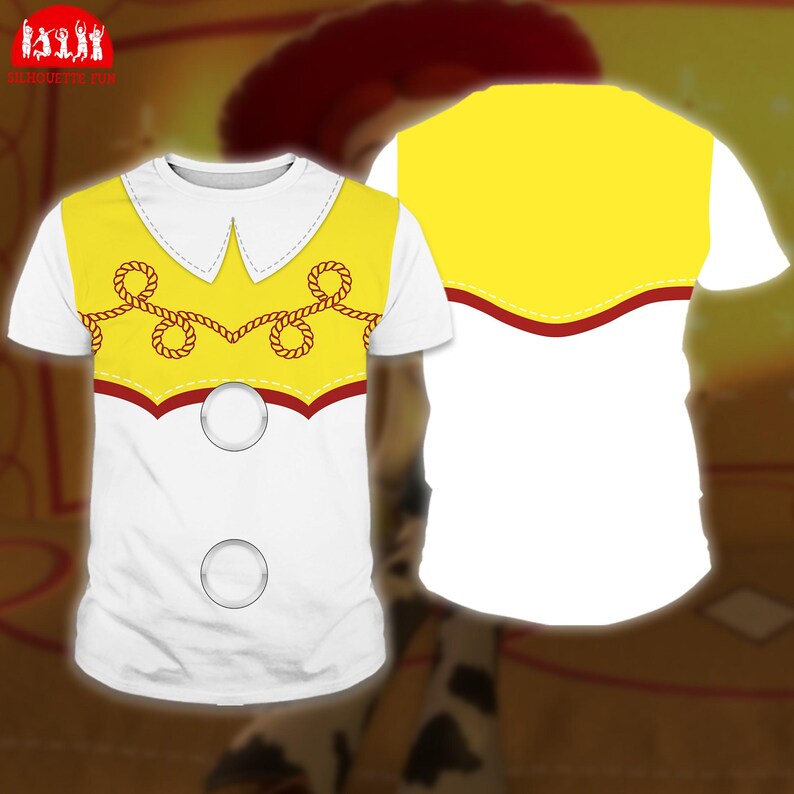 A white t-shirt with a yellow and red design, resembling a cowboy hat or top hat, and a red ribbon or decoration.