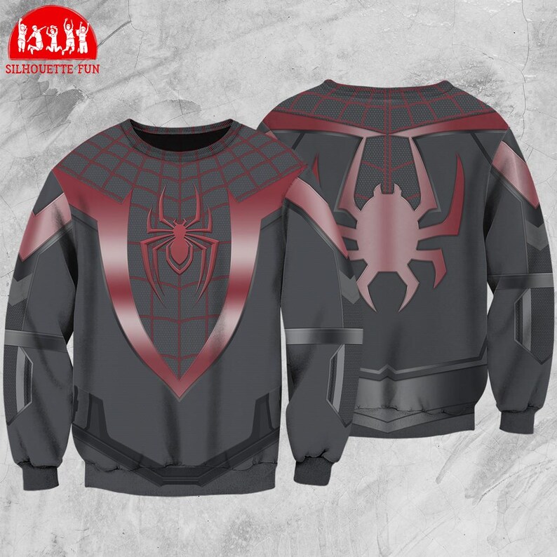 Pode incluir: Um moletom cinza escuro com um design de aranha vermelho e preto. A frente exibe um grande emblema de aranha, enquanto a parte de tr&aacute;s mostra um gr&aacute;fico de aranha correspondente. As mangas e os ombros t&ecirc;m um padr&atilde;o semelhante a uma teia de aranha.