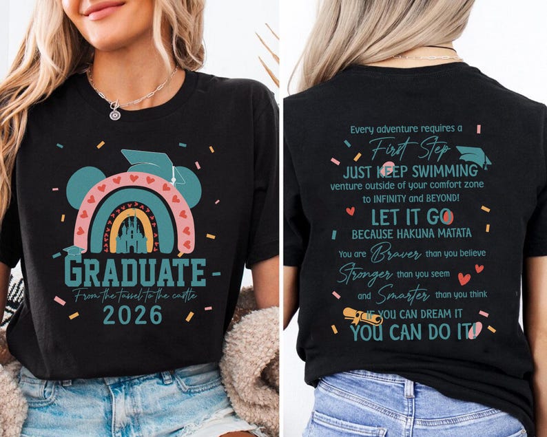 a woman wearing a black t-shirt with a colorful graphic and text on it. The text on the back of the t-shirt reads: "Graduate - From the Tissot to the Castle 2026".