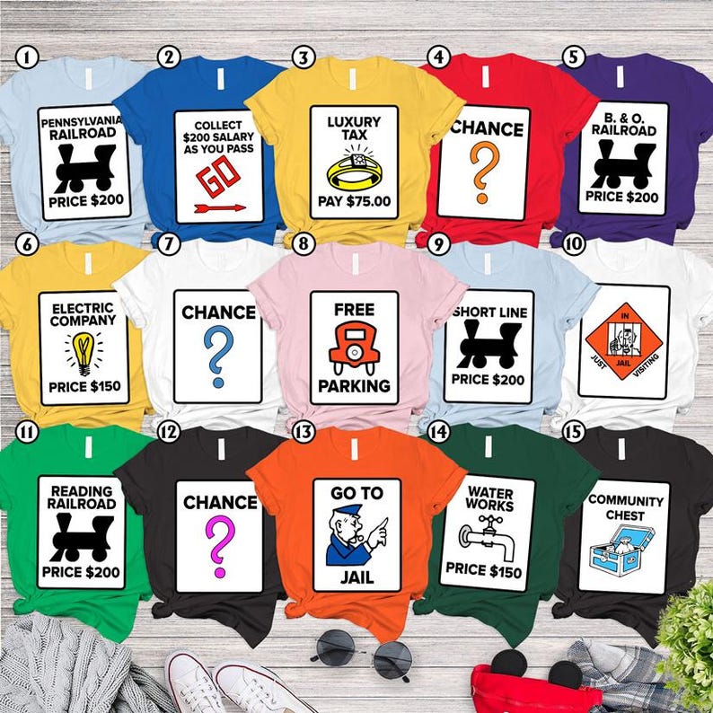 a bunch of t - shirts that are on a table