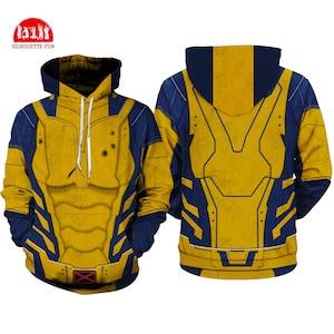 May include: A yellow and blue hoodie with a graphic print of a superhero's chest. The hoodie has a drawstring hood and a zipper closure.