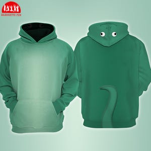 May include: Two green hoodies. One is a gradient from light to dark green, with a black-lined hood and a front pocket. The other is solid green, with a hood featuring white eyes and a curved tail design on the back. The logo "SILHOUETTE FUN" is in the top left corner.