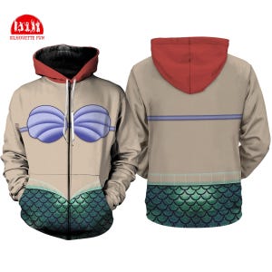 May include: A zip-up hoodie featuring a mermaid design. The front displays a purple seashell bra and green scale pattern. The back has a red hood, a blue stripe, and a green scale pattern. The hoodie has the text "SILHOUETTE FUN" on the top left.