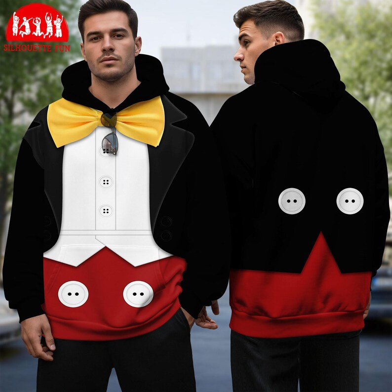 A man wearing a hooded sweatshirt with a unique design resembling a character from a movie or television show.