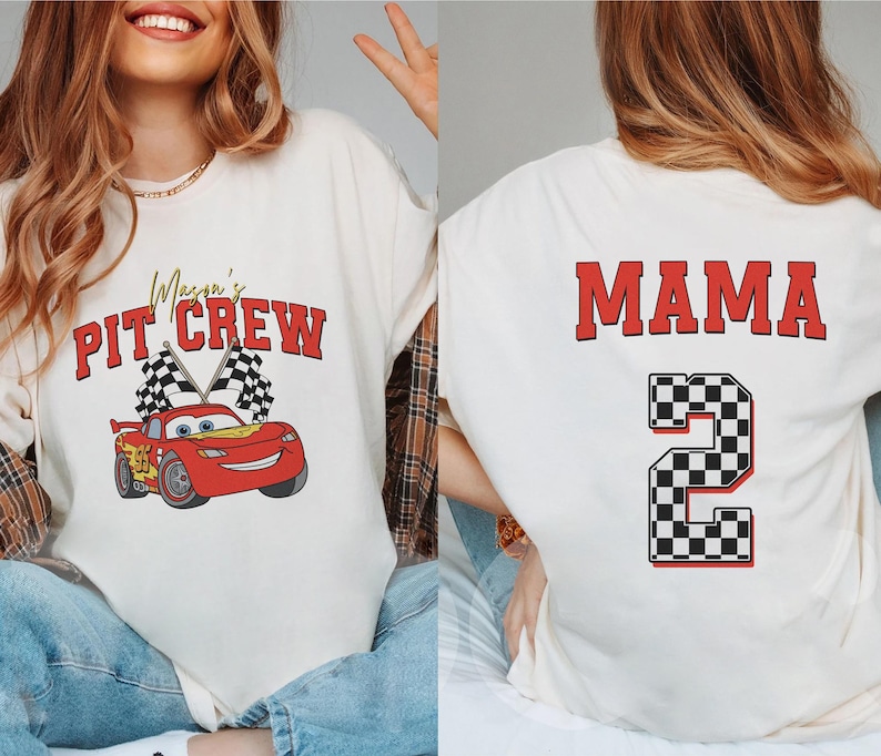 a woman wearing a white shirt with a red car on it