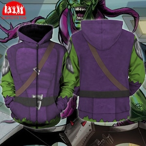 May include: Purple zip-up hoodie with green sleeves, featuring a design inspired by a comic book character. The hoodie has a brown strap across the chest and a black belt detail. The image includes the text "SILHOUETTE FUN".