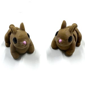 3D printed articulated mini bunny| mini animal| mini bunny| bunny | fidget toy| moveable toy| moveable bunny| 3d printed| articulated bunny