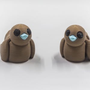 3D printed articulated mini duck| mini animal| mini duck| duck | fidget toy| moveable toy| moveable duck| 3d printed| articulated duck