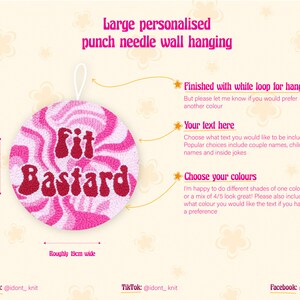 Puede incluir: Una decoraci&oacute;n de pared de aguja perforada de color rosa y blanco con el texto "Fit Bastard" en rojo. La decoraci&oacute;n mide aproximadamente 19 cm de ancho y 19 cm de alto.