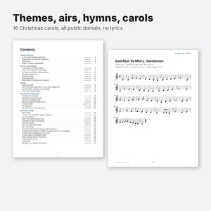 May include: A music book titled Themes, airs, hymns, carols featuring 16 Christmas carols. The left page displays a table of contents listing classical themes, airs, hymns, and carols. The right page shows sheet music for God Rest Ye Merry, Gentlemen.