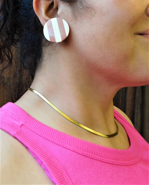 Big plastic shop earrings
