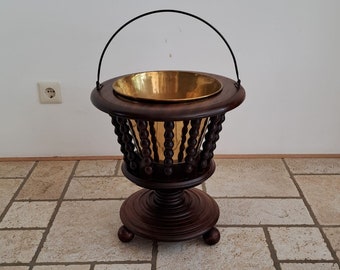 Vintage Dutch wood and brass bobbin plant stand.