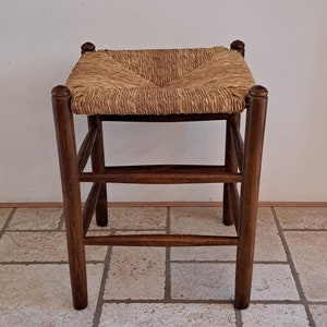 Vintage wooden stool with reed seat