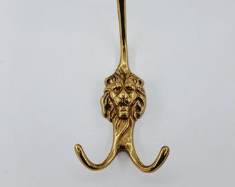 Vintage brass lions head coat hook