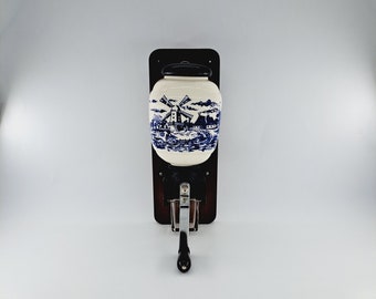 Vintage wall-mounted delft blue porcelain coffee grinder