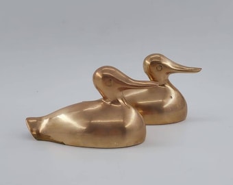 Set of two brass ducks