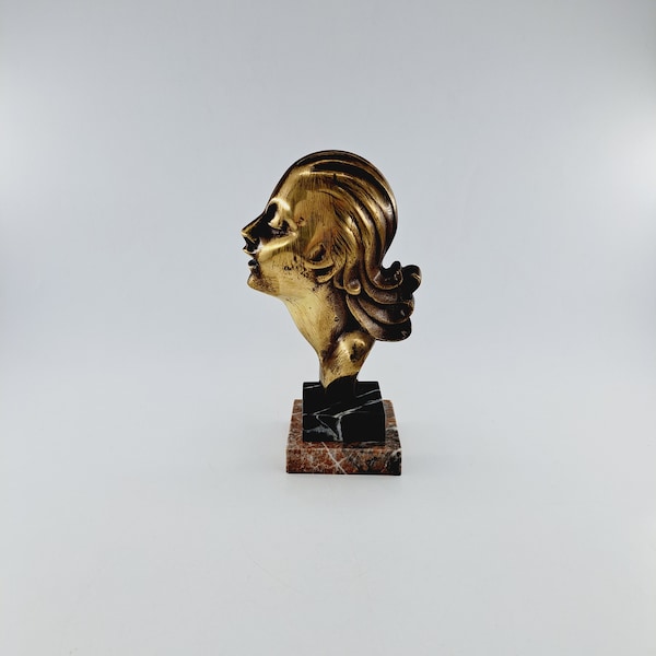 Art deco bronze head of a woman on marmer base 20's Hagenauer