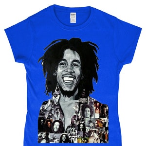 May include: A royal blue t-shirt featuring a black and white photo collage of Bob Marley. The collage includes a large image of Bob Marley smiling with his signature dreadlocks.