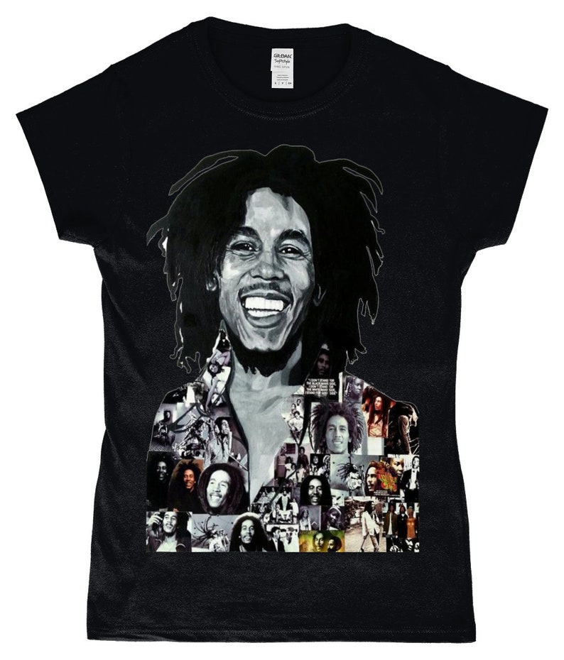 May include: Black t-shirt featuring a collage of images of Bob Marley. The main image is a close-up of Bob Marley smiling with his signature dreadlocks.