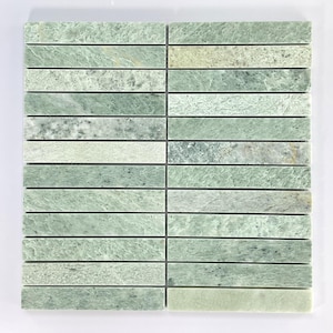 May include: A square mosaic tile sheet composed of rectangular tiles in varying shades of green. The tiles have a natural stone appearance with subtle veining and color variations. The mosaic is suitable for wall or floor applications.
