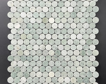 May include: A sheet of green marble mosaic tiles arranged in a grid pattern. Each tile is round and has a slightly irregular shape.