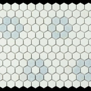 May include: White hexagonal mosaic tiles with a subtle blue and white marbling effect. The tiles are arranged in a staggered pattern.