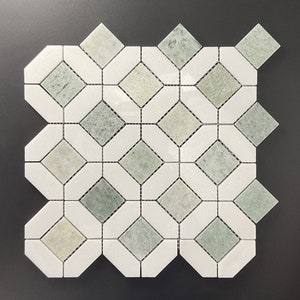 May include: A green and white marble mosaic tile sheet with a geometric pattern. The tiles are arranged in a diamond shape with a white border.
