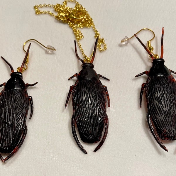 Cockroach necklace with gold coloured chain and cockroach earrings set.