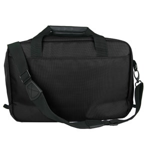 May include: Black laptop bag with a top handle and an adjustable shoulder strap. The bag has a zippered closure and a front pocket.
