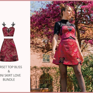 May include: A red and gold corset top with a heart-shaped cutout and matching mini skirt. The skirt has heart-shaped cutouts on the sides. The set is called "Corset Top Bliss & Mini Skirt Love Bundle".