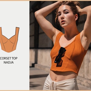 May include: A close-up of a woman wearing a burnt orange sleeveless corset top. The top has a sweetheart neckline and is cropped. The text "CORSET TOP NADJA" is visible below the image of the top.