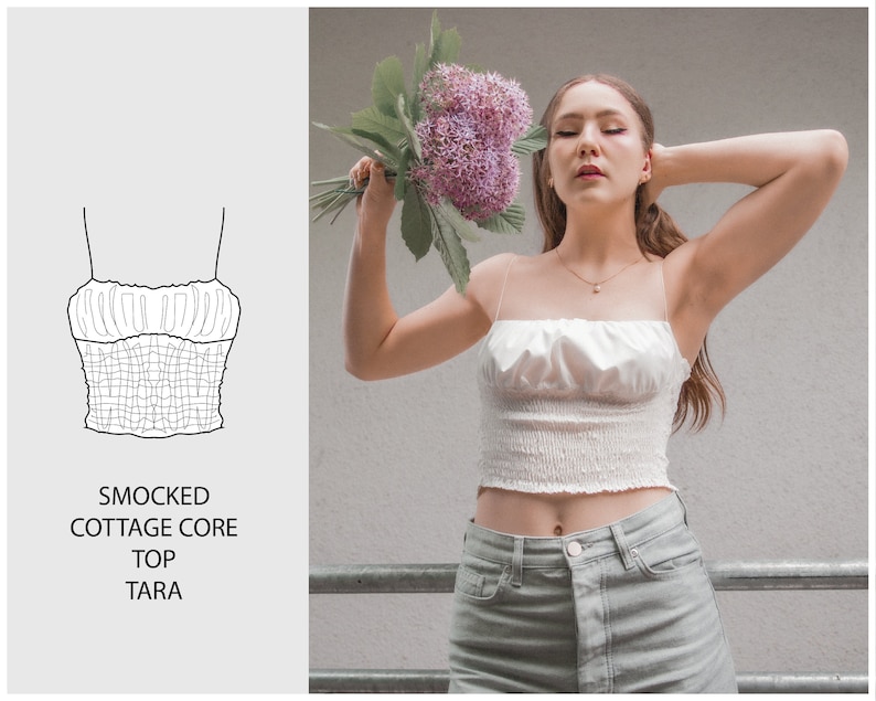 May include: A white smocked crop top with thin straps. The top has a gathered, ruffled neckline and a fitted bodice. The text "SMOCKED COTTAGE CORE TOP TARA" is printed below the image of the top.