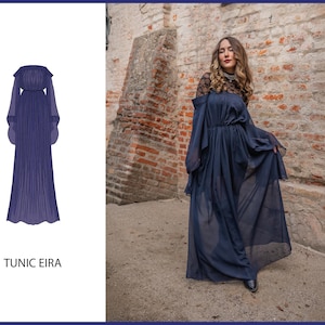May include: A long, flowing navy blue dress with off-the-shoulder sleeves and a pleated skirt. The dress is shown on a model standing in front of a brick wall. The text "TUNIC EIRA" is at the bottom of the image.