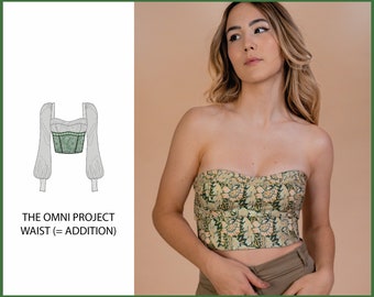 May include: A green and white floral print crop top with a strapless design. The top has a fitted bodice and a slightly cropped length. The text "THE OMNI PROJECT WAIST (= ADDITION)" is visible in the image.