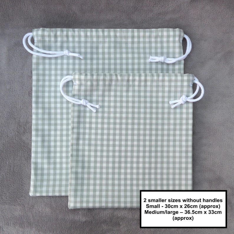 Handmade drawstring bags in a light sage green gingham cotton rich canvas fabric with white cotton braided cords.

Small with drawcord - 30cm x 26cm 
Medium/large with drawcord - 36.5cm x 33cm