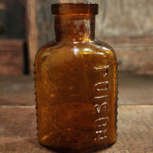 Antique Amber Glass Poison Bottle