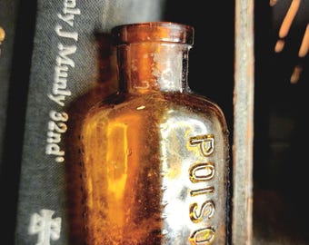 Antique Amber Glass Poison Bottle