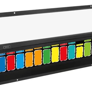 May include: A rectangular black display case with a hinged lid and a clear front panel. The interior features a horizontal row of fourteen colorful rectangular labels in shades of blue, red, orange, yellow, and green, arranged against a black background.