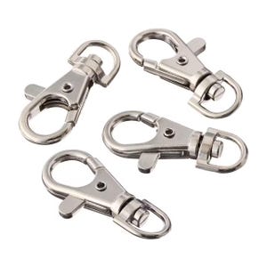 May include: Four silver-colored swivel snap hooks. Each hook has a spring-loaded clasp and a rotating eyelet. The hooks are made of metal and are designed for attaching to straps or other items.