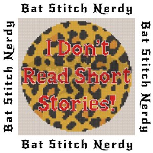 May include: A round cross-stitch pattern with a leopard print background. The text "I Don't Read Short Stories!" is written in red letters on the pattern.