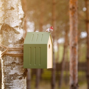 Green modern bird house