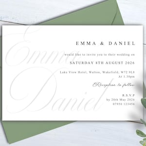 May include: A wedding invitation featuring the names EMMA & DANIEL in elegant script. The invitation details the wedding date, time, and location: Lake View Hotel, Walton, Wakefield. Presented on a white card with a sage green envelope.