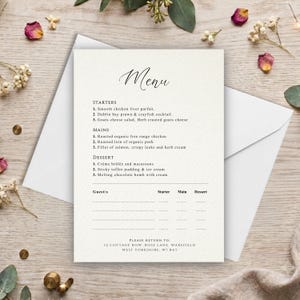 May include: A white paper menu card with black text featuring sections for Starters, Mains, and Dessert, plus a guest selection table. The menu lists items like chicken liver parfait and salmon, with a return address in Wakefield, West Yorkshire.