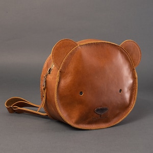 animal studs leather backpack SandraWang Gothic Skull Studded for Women & Men, Structured PU Punk Bookbag with Drawstring Flap, A4 & Tablet Friendly Alternative Fashion Design: Clothing, Shoes & Jewelry Backpacks Marc Nolan SOHO backpack with hand Leather Animal Shaped Backpack -