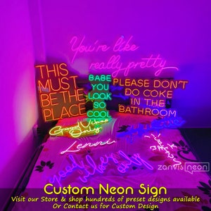 May include: A collection of neon signs with various phrases and designs, including "You're like really pretty", "This must be the place", "Babe you look so cool", "Please don't do coke in the bathroom", "Good vibes only", "Lenni", and "Good vibes only". The signs are displayed on a bed with a purple background. The text "Custom Neon Sign" is displayed at the bottom of the image. Visit our Store & shop hundreds of preset designs available Or Contact us for Custom Design.