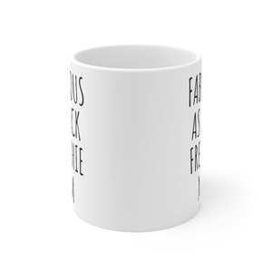 May include: White ceramic mug with black text that reads "Fabulous as heck while I'm at it".