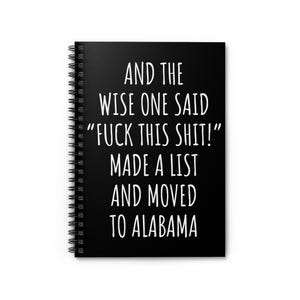 May include: Black spiral-bound notebook with white text that reads: "AND THE WISE ONE SAID 'FUCK THIS SHIT!' MADE A LIST AND MOVED TO ALABAMA."