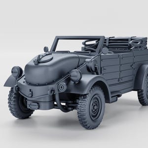 May include: A grey model of a classic military vehicle, with a convertible roof, circular headlights, and chunky tyres. The vehicle has a detailed design with visible doors and a spare wheel mount. The model is set against a plain white background.