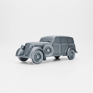 Peut inclure: Une voiture miniature de type break vintage grise avec un extérieur détaillé et des roues noires.