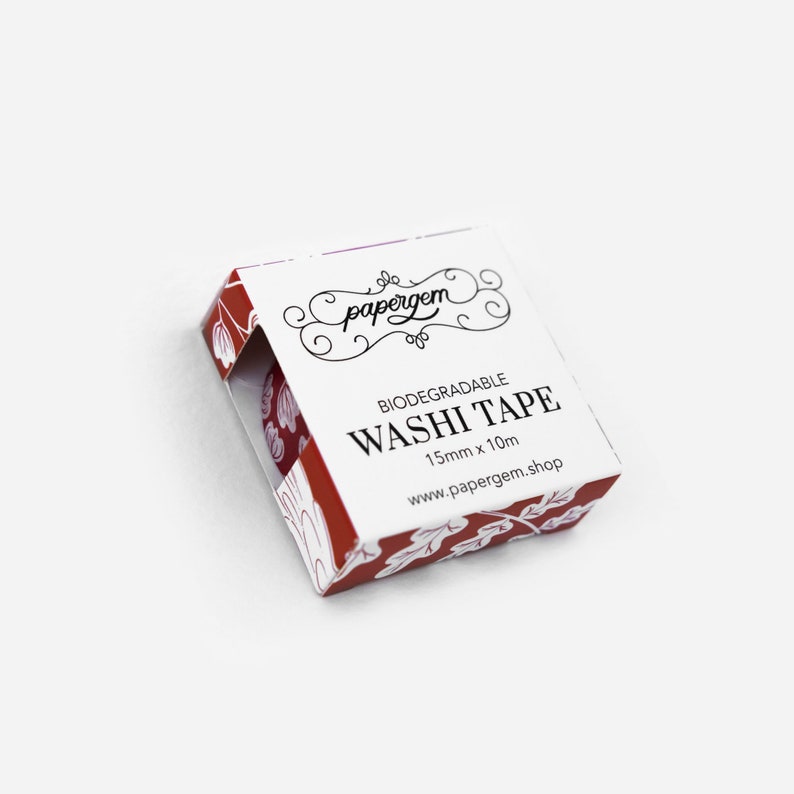 May include: A small, red and white patterned box with the text "papergem" and "BIODEGRADABLE WASHI TAPE 15mm x 10m www.papergem.shop" printed on it.
